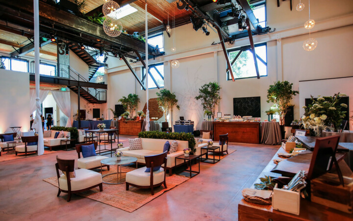 A unique event venue in San Francisco with lots of plants and extremely high ceilings that is know as the Pearl