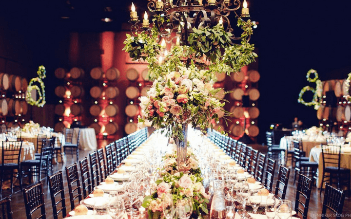 Oak barrels line the walls of a unique event venue in San Francisco