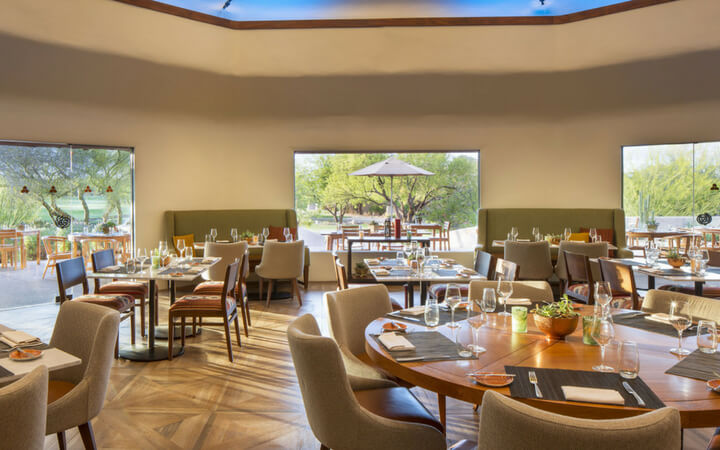 A well-lit dining space at the Boulders resort & spa