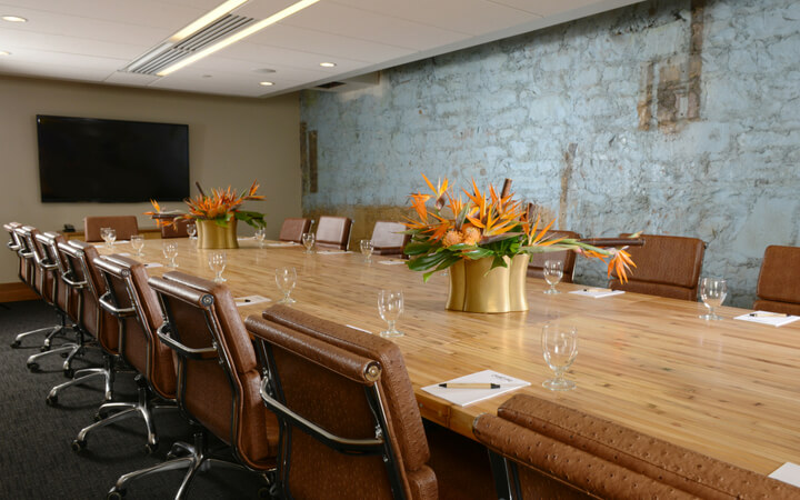 A boardroom setup at the Denver event venue the Crawford Hotel