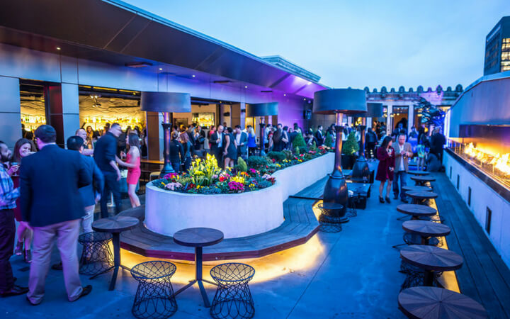 A rooftop lounge area serves as a venue in Philadelphia at the Kimpton Hotel Monaco